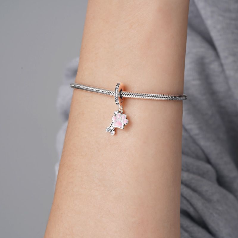 Charm Colgante Pata y Hueso